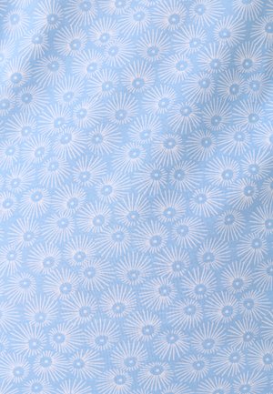 Tissu bleu clair avec un motif répétitif de formes florales radiales blanches, ressemblant à des marguerites stylisées ou des éclats de soleil.