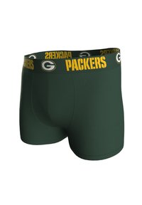 Zelené boxerky s těsným střihem, s žluto-černým elastickým pasem s nápisem „PACKERS“ a návrhem loga.