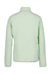 Veste texturée vert clair avec un col haut, présentant un motif en relief de petites formes se chevauchant. Manches longues et ourlet droit.