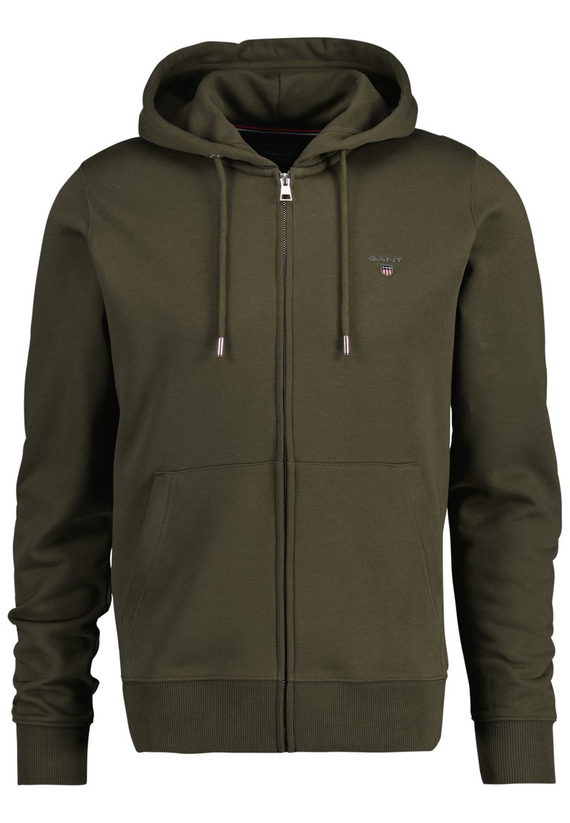 Felpa con cappuccio verde oliva, con zip completa, polsini a costine, tasche frontali e logo sul petto. Tessuto in morbida miscela di cotone.