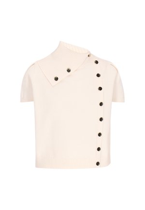 Lühikeste varrukatega kreemivärvi kudum, millel on suur soonikrae ja kaks rida musti nuppe, üks vertikaalne ja üks kaldus kaelusel.