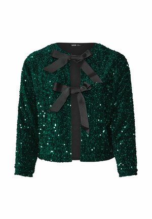 Grünes, mit Pailletten verziertes Jacket mit rundem Kragen, vorn mit Schleifen und langen Ärmeln. Die strukturierte Oberfläche reflektiert das Licht und erzeugt Glitzer.