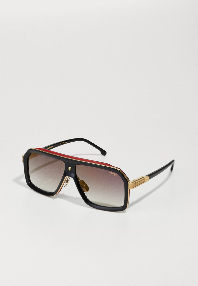 Mustat neliönmuotoiset aurinkolasit, joissa on kultaiset korostukset, liukuväriset linssit ja punaiset yksityiskohdat ylhäällä. Tyylikkäät sarvet, joissa on kohokuvioitu brändi.