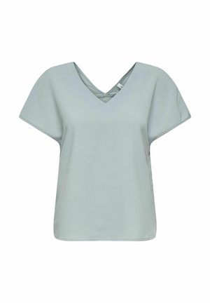 Haut vert menthe à col en V avec des manches courtes et larges, et une coupe décontractée. Texture lisse et design minimaliste. Pas de motifs ni de détails métalliques.