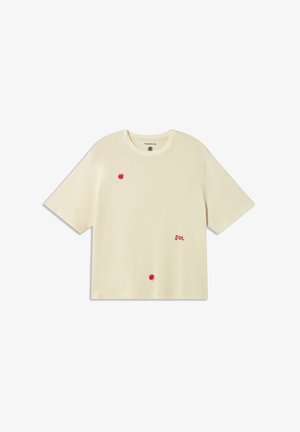 Cream short-sleeve T-shirt with red embroidered accents, including flowers and the word "SOL." Soft fabric, relaxed fit, crew neckline.