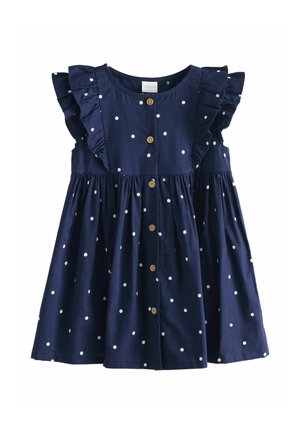 Marineblaues Kleid mit weißen Punkten, Rüschenärmeln, vorderen Knöpfen und gerafftem Rock, aus leichtem Stoff gefertigt.
