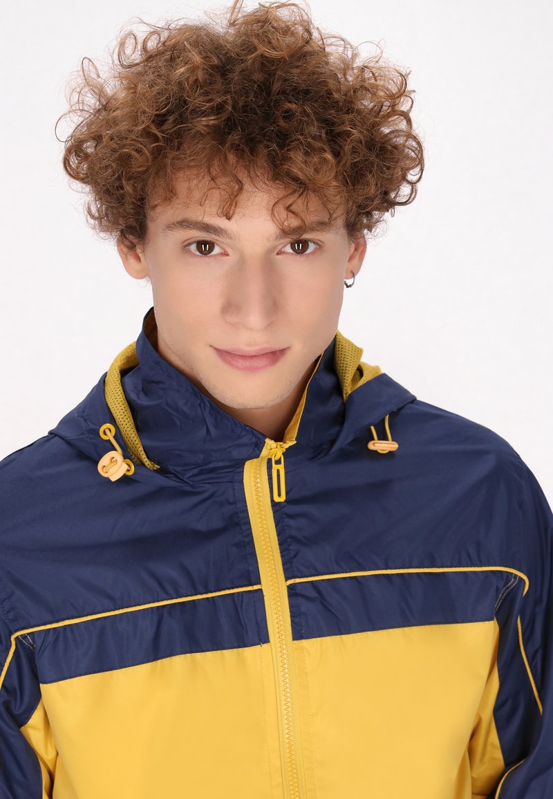 Mo Trainingsjacke gelb marine/gelb