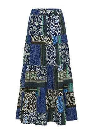 Maxi-Rock mit gestuftem Design mit Patchwork-Mustern in Blau, Schwarz, Weiß und Grün mit floralen und geometrischen Motiven.