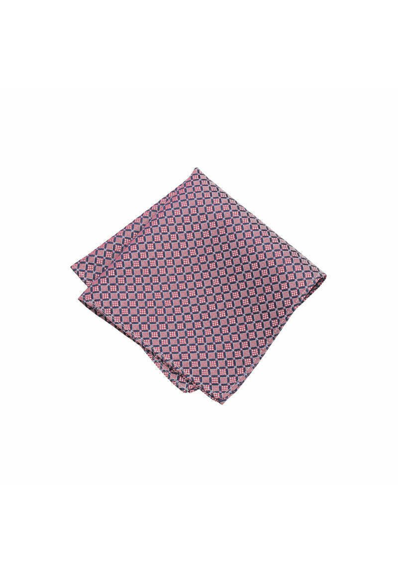 Square silk pocket square featuring a navy blue background with a geometric red and white pattern. The edges are neatly sewn.