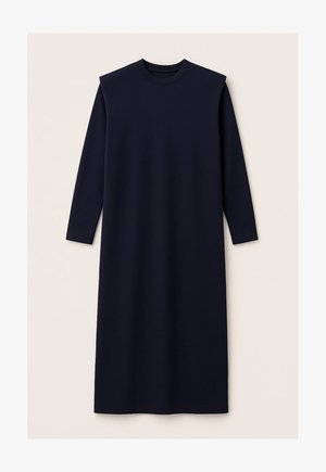 Marinblå långärmad klänning med rundad halsringning och axelvaddar, gjord av ett mjukt, stretchigt tyg, som faller till mitt på vaden.