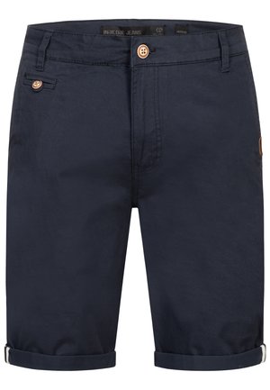 Marineblaue Shorts aus Baumwolle, mit Knopfverschluss, umgeschlagenem Saum, Fronttasche und einem Lederlogo-Patch auf der Rückseite.