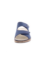 Blue adjustable sandal with a textured upper, wide straps, and a cork-like sole. Open design for breathability and comfort.