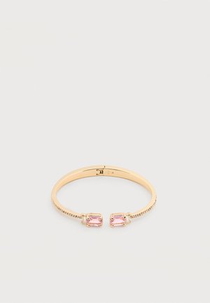 Gold-tone open bangle bracelet with two rectangular pink gemstones at each end and a textured band design.