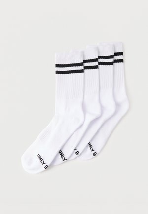 Witte enkelsokken met twee zwarte strepen aan de bovenkant en zwarte tekst op de zolen. Gemaakt van een geribbelde katoenmix.