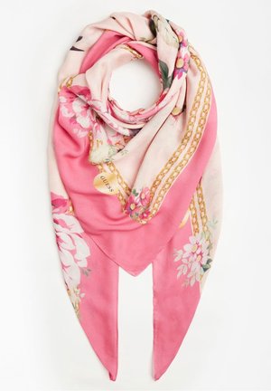 Pink floral scarf with gold chain details, folded in a loop with two pointed ends, featuring the brand name Guess on a gold heart tag.