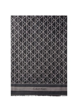 Dunkelgrauer rechteckiger Schal mit wiederholendem hellgrauem geometrischem Muster und dem Text "Calvin Klein" an einem Rand nahe dem unteren Rand.