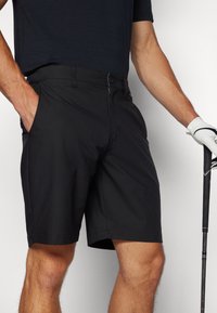 TravisMathew WANDERLUST SHORT - Sporta šorti - black