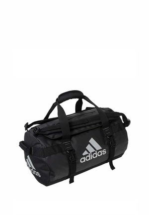 Zwarte Adidas duffel tas met dubbele handvatten, verstelbare riemen en wit Adidas-logo aan de voorkant en zijkant.