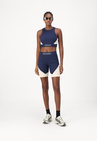 Tommy Jeans GAME DAY CYCLING TOP - Topper - dark ink