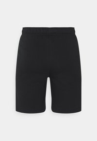 Shorts de sport noirs avec une taille élastique, fabriqués à partir d'un tissu lisse et extensible. Longueur mi-thigh avec une coupe droite. Pas d'accents visibles.