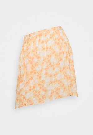 Jupe florale en tissu léger ; présente un motif de fleurs orange et blanches sur un fond jaune pastel ; taille élastique.
