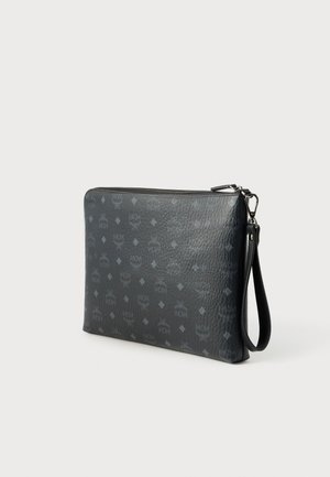 Rankning 6: MCM - DIAMOND FLAT POUCH - Kuvertväska