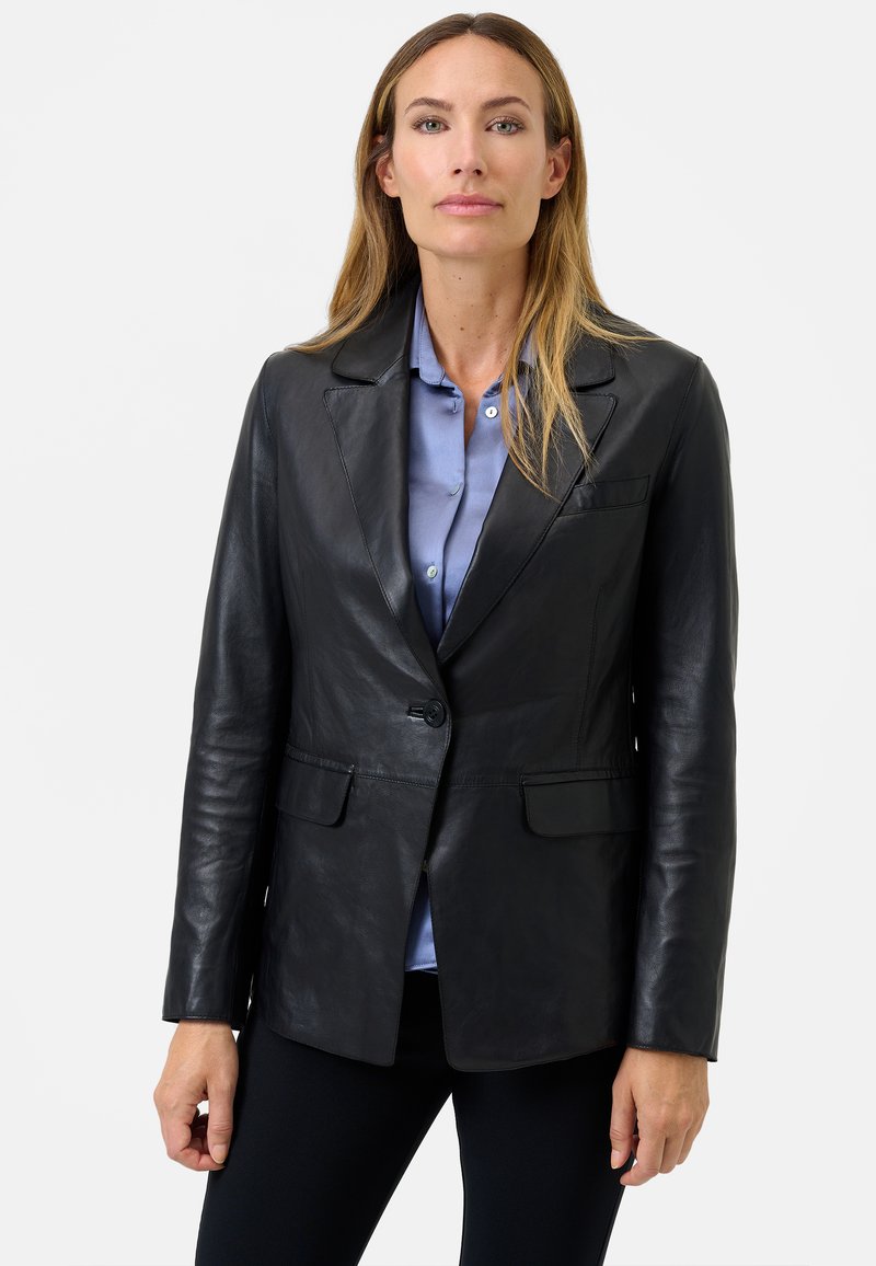 Black leather blazer featuring a notched lapel, single button closure, and two front pockets. Smooth texture with a tailored fit.