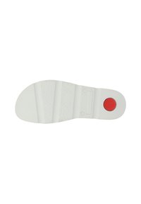 White rubber shoe sole with textured surface, three ridges, and a circular red accent. Features a logo and a flat heel for stability.
