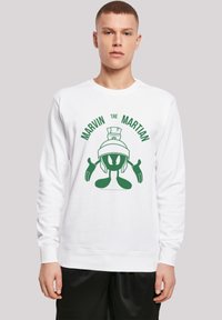 Felpa bianca con una grafica verde di Marvin il Marziano al centro, con il testo "Marvin il Marziano" che si curva sopra il design.