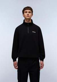 Black fleece pullover with a high collar and quarter-zip. Features a small embroidered logo on the chest and ribbed cuffs.