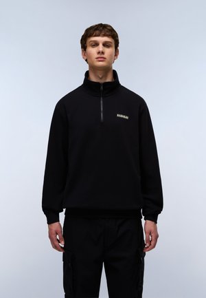 Black fleece pullover with a high collar and quarter-zip. Features a small embroidered logo on the chest and ribbed cuffs.