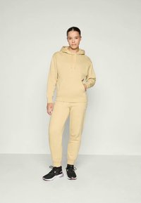 Puma LOUNGEWEAR SUIT COMFORT SET - Spodnji deli trenirk - pebble path