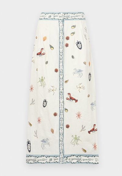 White linen skirt featuring colorful embroidery of sea creatures, shells, and designs. Trimmed with a blue scalloped border and button closure.