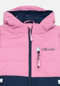 Pink and navy hooded jacket with a quilted design. Features a front zipper and side pockets, along with a logo on the chest.