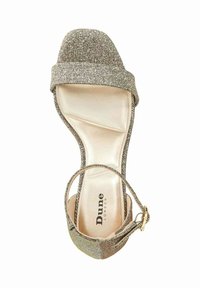 Gold glitter high-heeled sandal with a wide strap over the toe, ankle strap with buckle, and a smooth, beige insole. Brand logo visible.