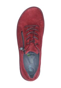Red suede shoe with a rounded toe, lace-up front, and a side zipper. Features a textured interior and dark rubber sole.