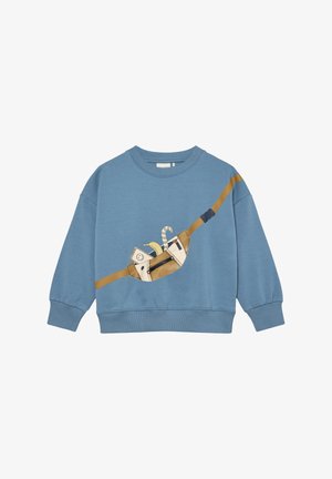 Felpa di cotone blu con un design a cartone animato di un gatto in una borsa, con accenti marroni e beige e polsini e orlo a coste.