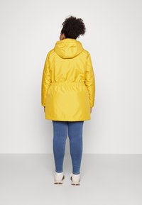 ONLY Carmakoma CARIRENA COAT - Parka - tawny olive