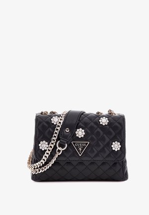 Borsa a tracolla nera trapuntata realizzata in materiale sintetico, con una tracolla in catena metallica, dettagli in strass floreali e un logo triangolare.