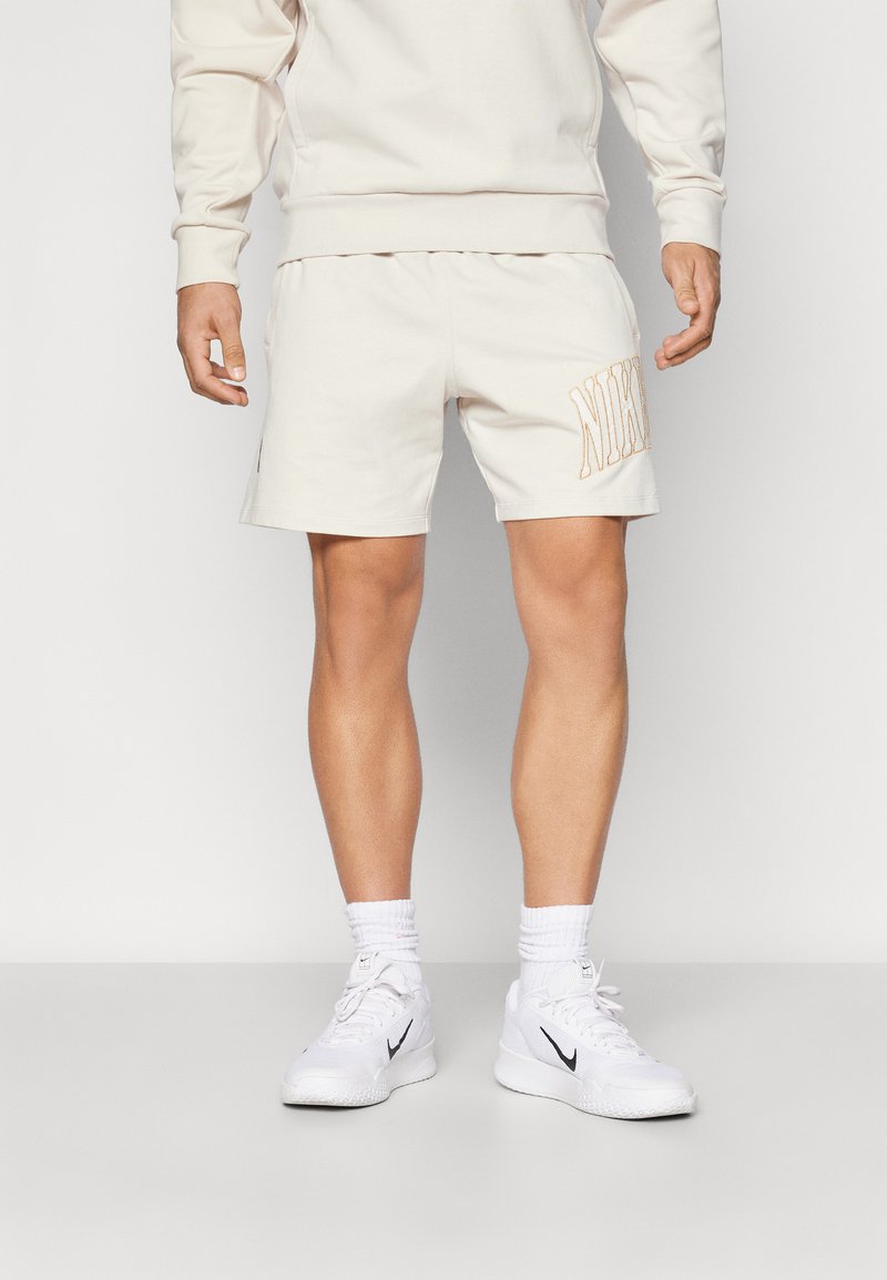 Nike Performance HERITAGE SHORT - Short de sport - light orewood brown/pale ivory