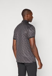J.LINDEBERG Sports TOUR TECH PRINT - Polo marškinėliai - tonal black