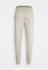 Calvin Klein Jeans Teplákové kalhoty - grey