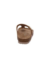 Brown cork sandal with a textured sole, a single strap featuring a gold buckle, and a contoured footbed for comfort.