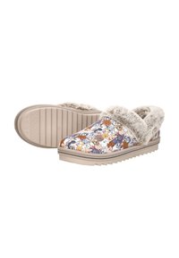Multikleurige slipper met een met bont gevoerd kraagje, een gestructureerde zool en een afwisselend patroon van cartoonhondillustraties op de stof.