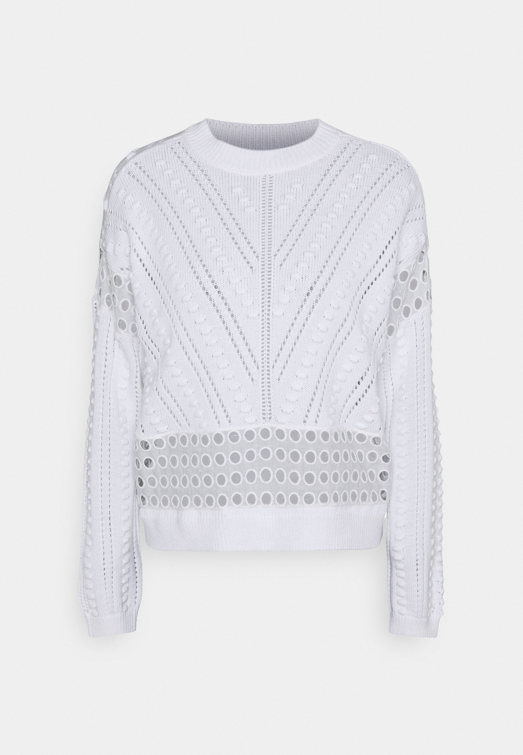 white bobble jumper