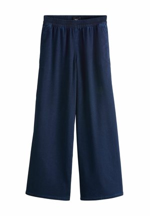Pantalon large bleu marine avec taille élastique et poches latérales, conçu pour un usage décontracté.