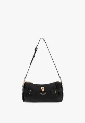 Sac à main en cuir noir avec une forme incurvée, doté d'une fermeture éclair et d'un logo en métal doré, d'une bandoulière réglable et de détails à boucles latérales.