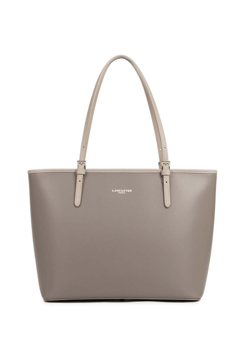 Taupe smooth leather tote bag with two adjustable shoulder straps and small white "Lancaster Paris" logo on front.