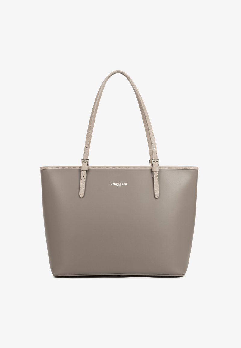 Taupe smooth leather tote bag with two adjustable shoulder straps and small white "Lancaster Paris" logo on front.