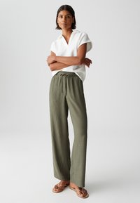 OPUS HIGH RISE LONG WIDE FIT CRINKLE - Trousers - olive leaf